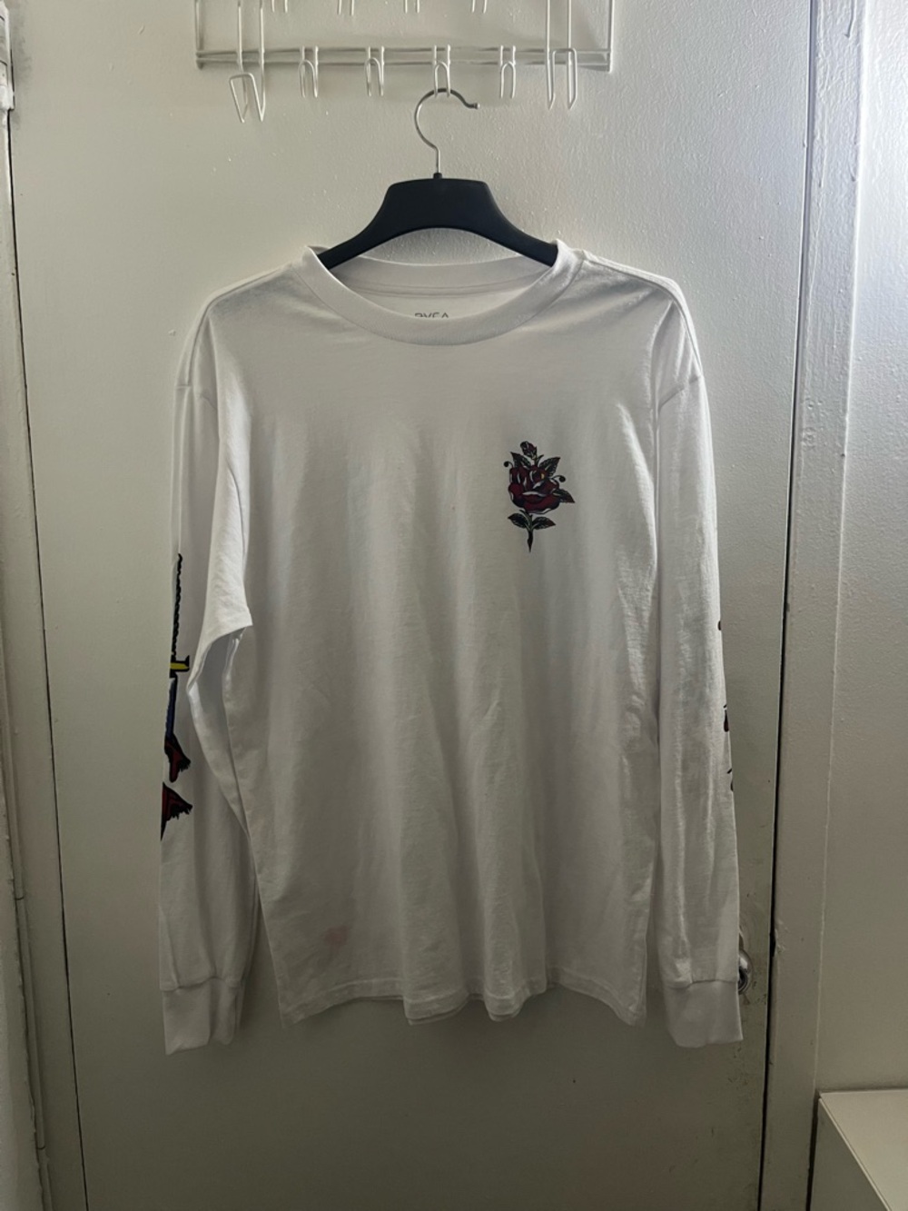 RVCA White Long Sleeve Tee with Rose Chest Graphic and Sleeve Art